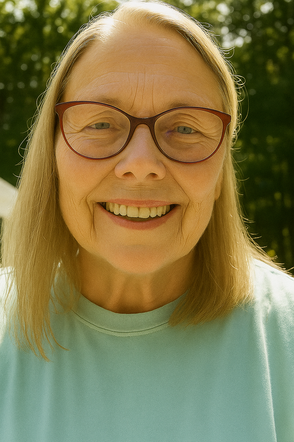 Smiling Portrait in Sunlit Greenery